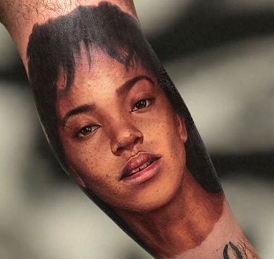 Flora Carter Tattoo on her Fan Arm