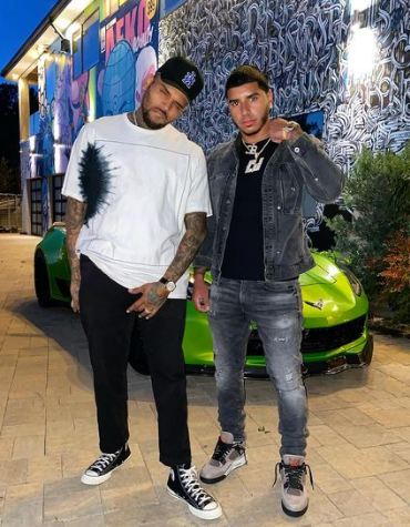 CJ with his friend Chris Brown