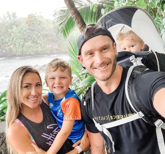 Thomas Delauer with his wife and kids